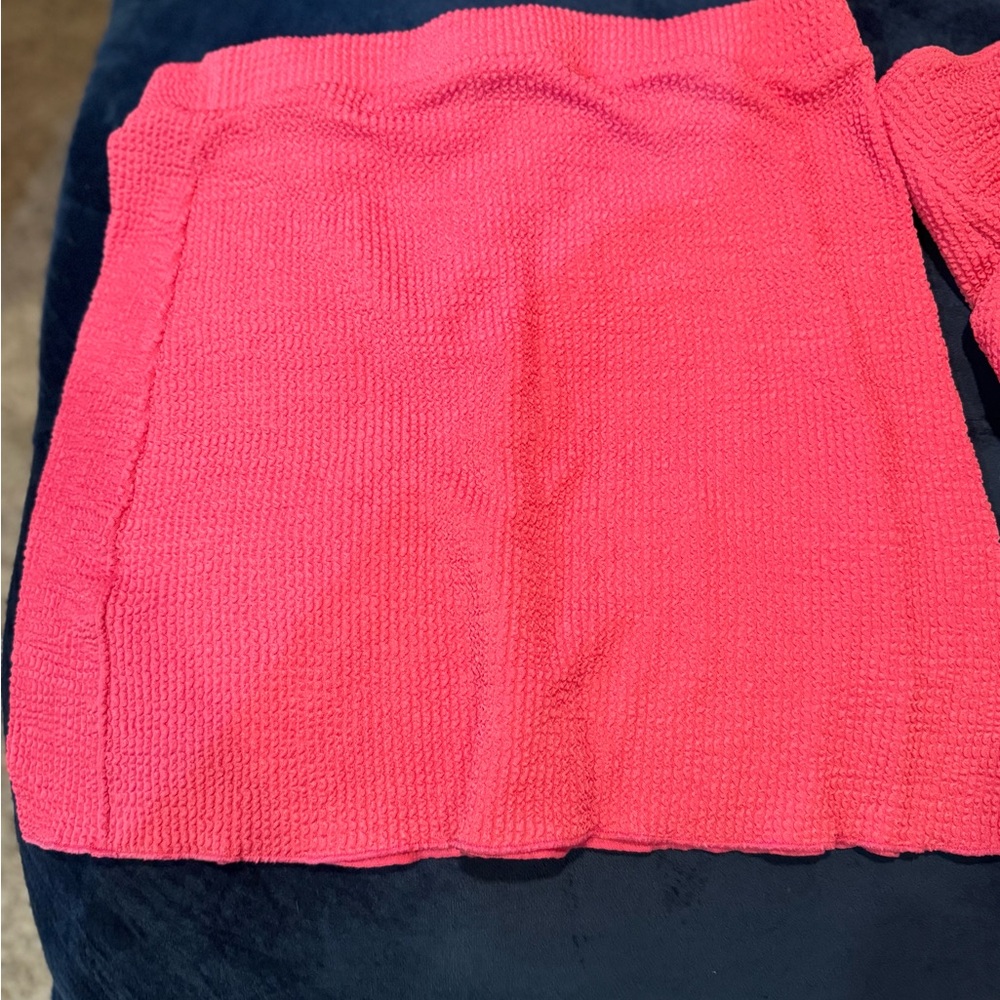 Three-piece, hot pink high waisted swimsuit set.